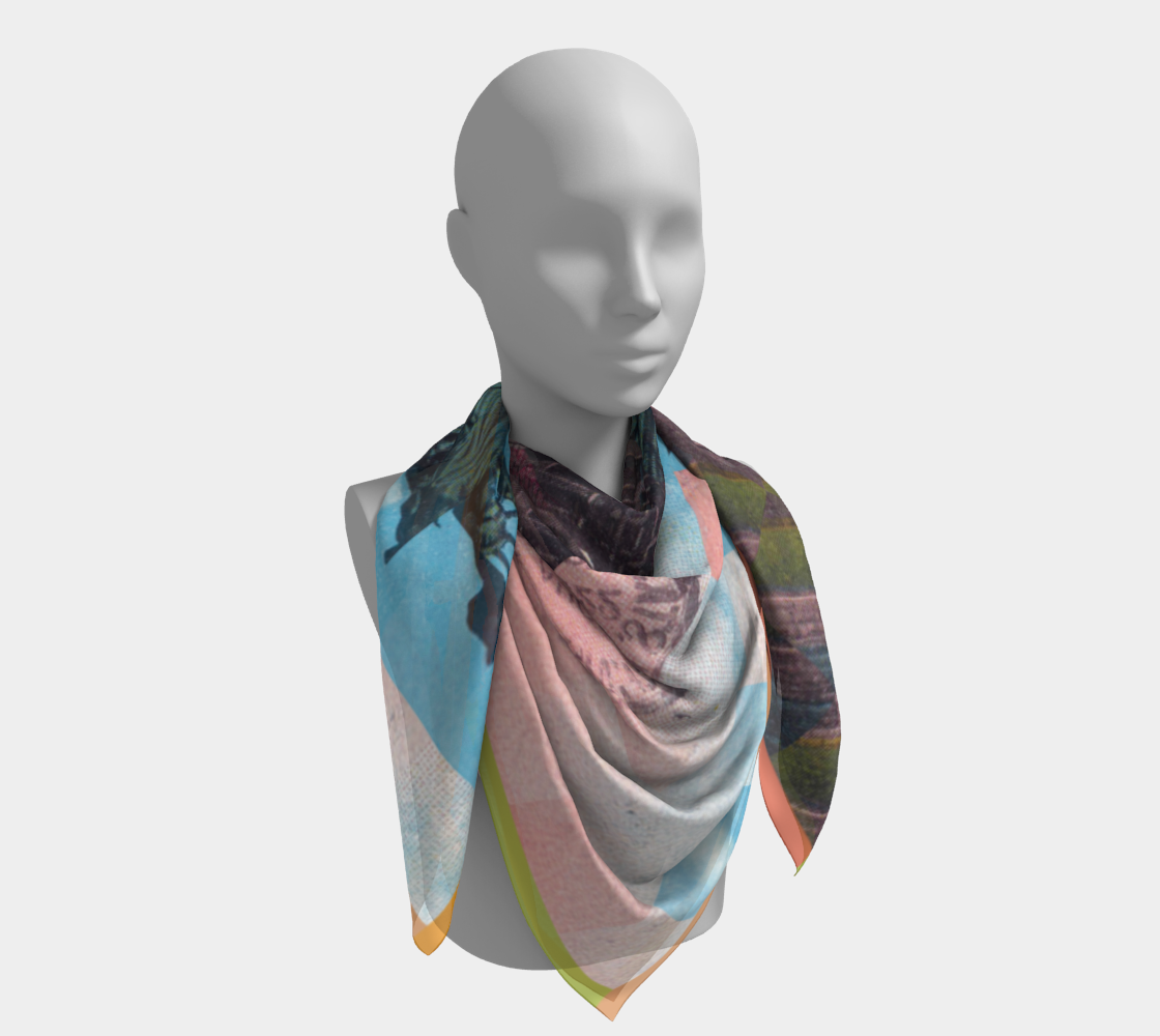 Elegant styling of the 'Statue of Liberty 1.1' scarf by Leeloo + Zohan, featuring a colorful representation of the Statue of Liberty.