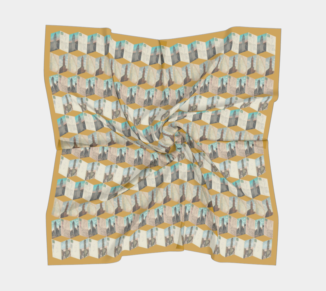 The Manhattan Towers 1.0 silk scarf displayed in a twisted format, showcasing a unique design of early New York skyscrapers by Leeloo + Zohan.