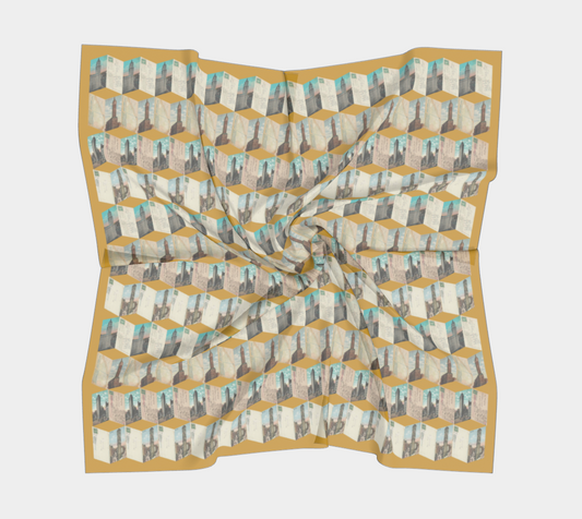 The Manhattan Towers 1.0 silk scarf displayed in a twisted format, showcasing a unique design of early New York skyscrapers by Leeloo + Zohan.