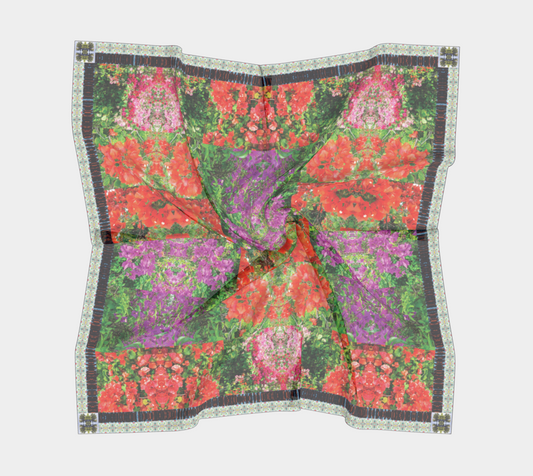 Maui Bloom scarf by Leeloo + Zohan displayed in a creative folded manner, highlighting the lush floral colors and design.