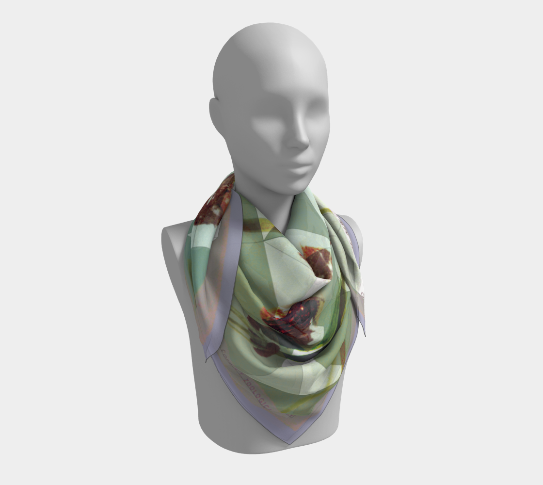 Stylish presentation of the New York Aquarium sea-horse silk scarf by Leeloo + Zohan, emphasizing the intricate illustration and soft texture.