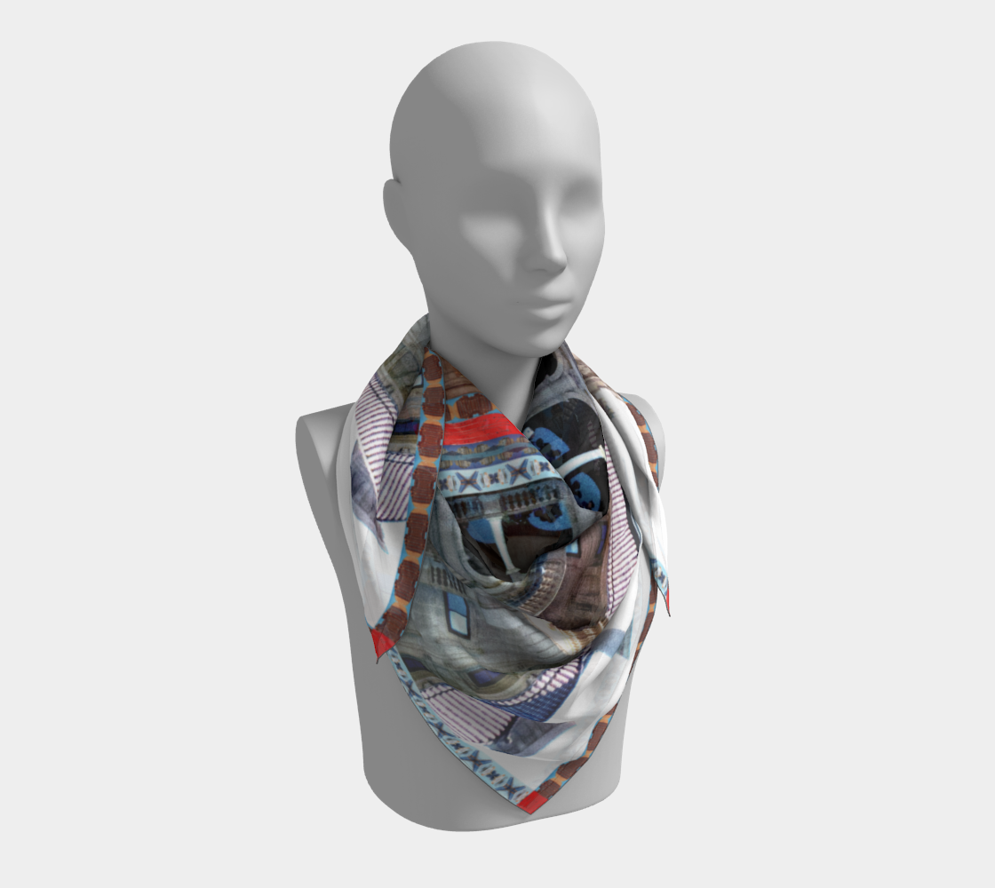 Close-up view of Leeloo + Zohan's limited edition scarf featuring The Vatican and The Breakers, draped elegantly on a mannequin.