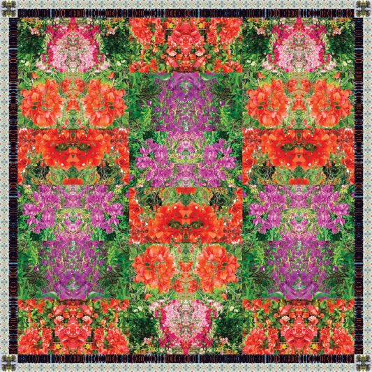 Maui Bloom scarf by Leeloo + Zohan featuring a vibrant floral design with reds, pinks, and purples, showcasing a kaleidoscopic pattern.