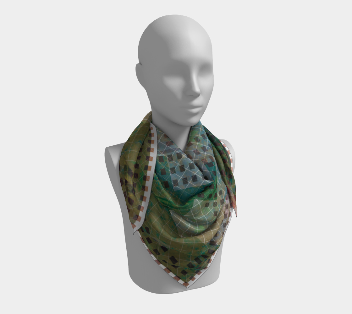 Silk scarf draped on a mannequin, displaying intricate floral designs and the Leeloo + Zohan logo, emphasizing contemporary art in fashion.