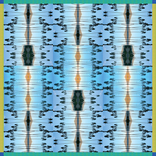 Colorful mirrored pattern scarf featuring images of Haleakalā Volcano and palm trees, designed by Leeloo + Zohan, titled Haleakalā Horizon.