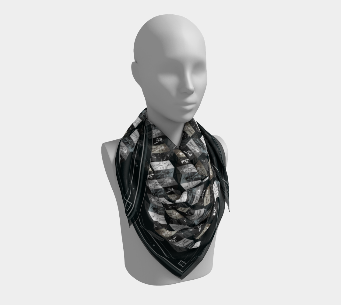 Silk scarf draped on a mannequin, exhibiting a bold geometric pattern by Leeloo + Zohan, named David Michelangelo.