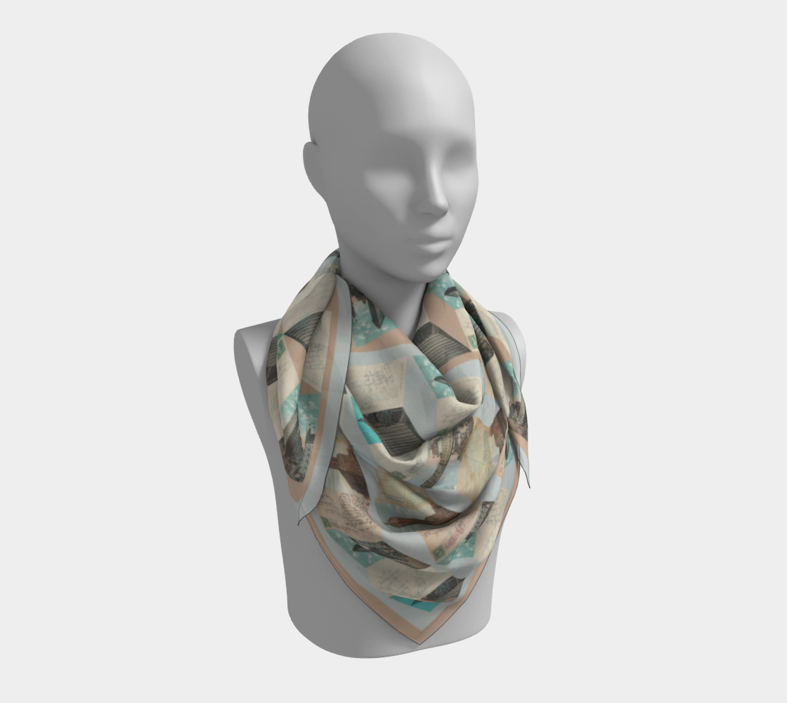 The Manhattan Towers 2.0 scarf by Leeloo + Zohan artfully draped on a mannequin, revealing its chic geometric pattern inspired by iconic NYC landmarks.