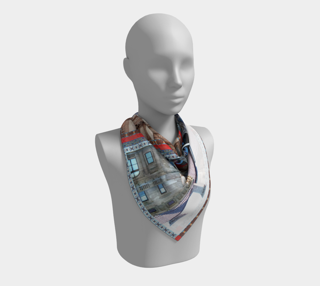 Silk scarf by Leeloo + Zohan styled on a mannequin, highlighting the detailed imagery of The Vatican and The Breakers for a chic look.