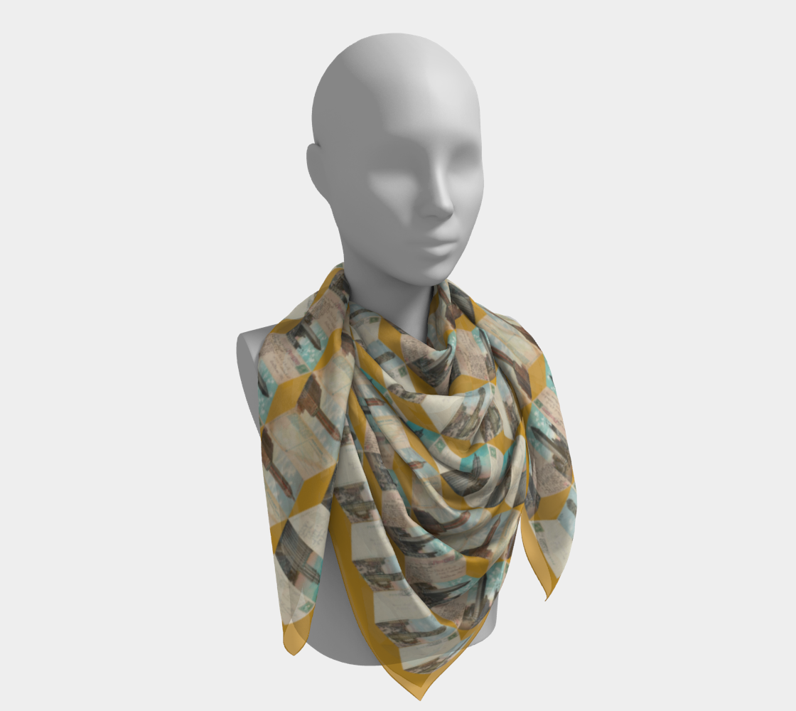 The Manhattan Towers 1.0 silk scarf elegantly styled on a mannequin, showcasing its artistic representation of New York's architectural history by Leeloo + Zohan.