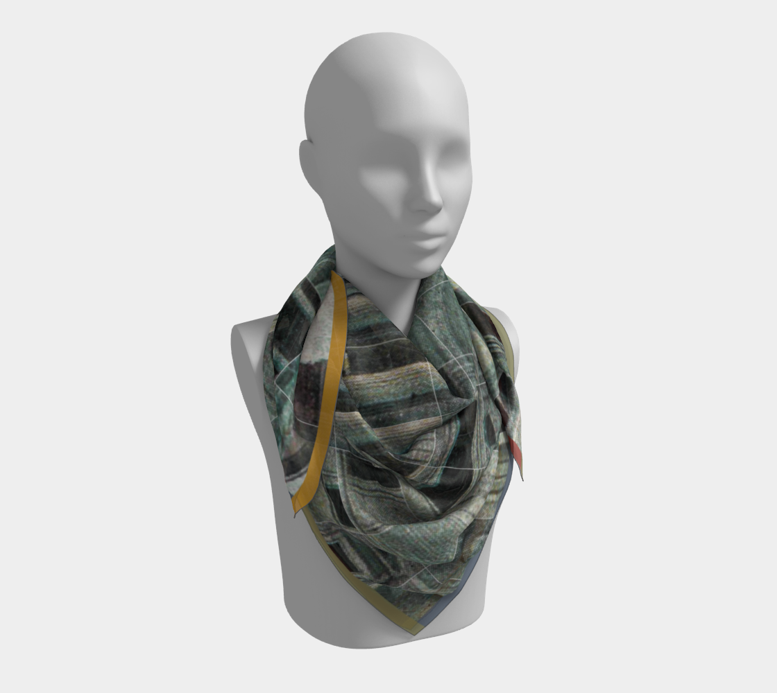 Silk scarf elegantly draped on a mannequin, featuring the Metropolitan Museum of Art design by Leeloo + Zohan.