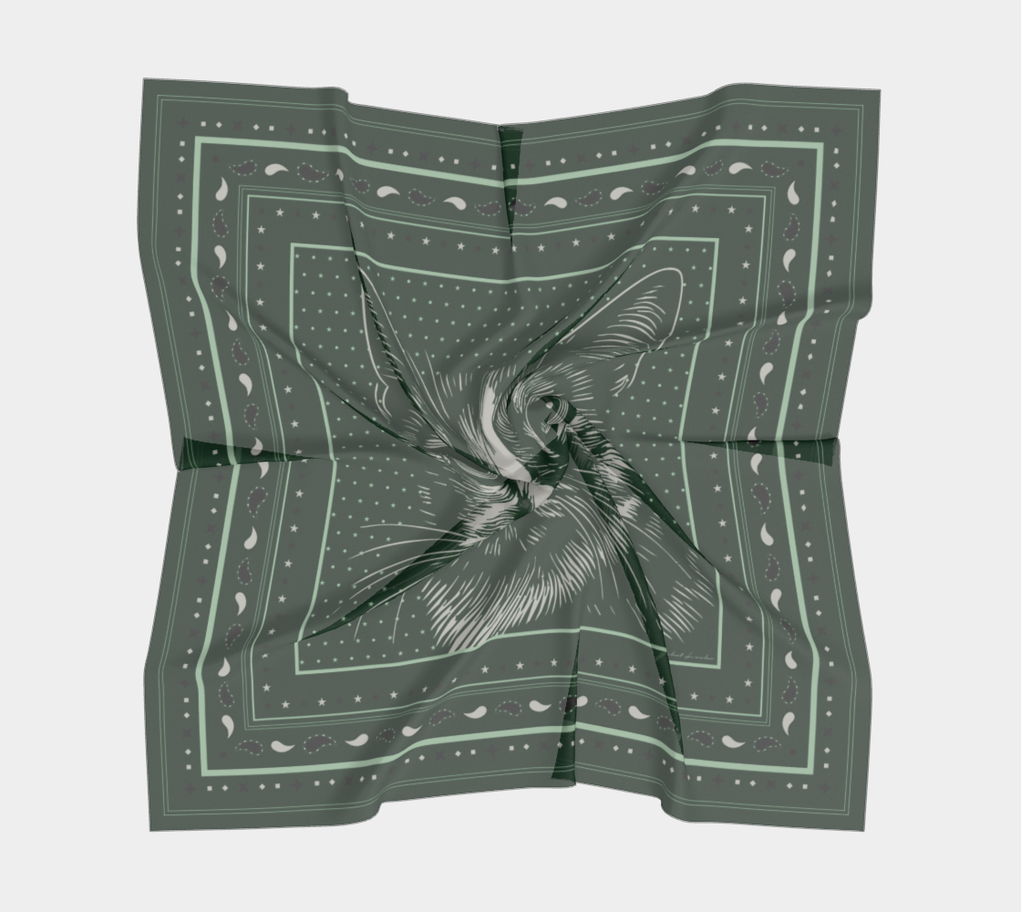 Le Chat Leeloo silk scarf displayed in a draped position, showcasing its intricate cat illustration and design by Leeloo + Zohan.