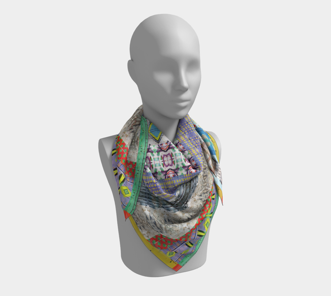 Mannequin wearing a beautifully patterned silk scarf called 'Graffiti of NYC' by Leeloo + Zohan, highlighting its colorful geometric design.