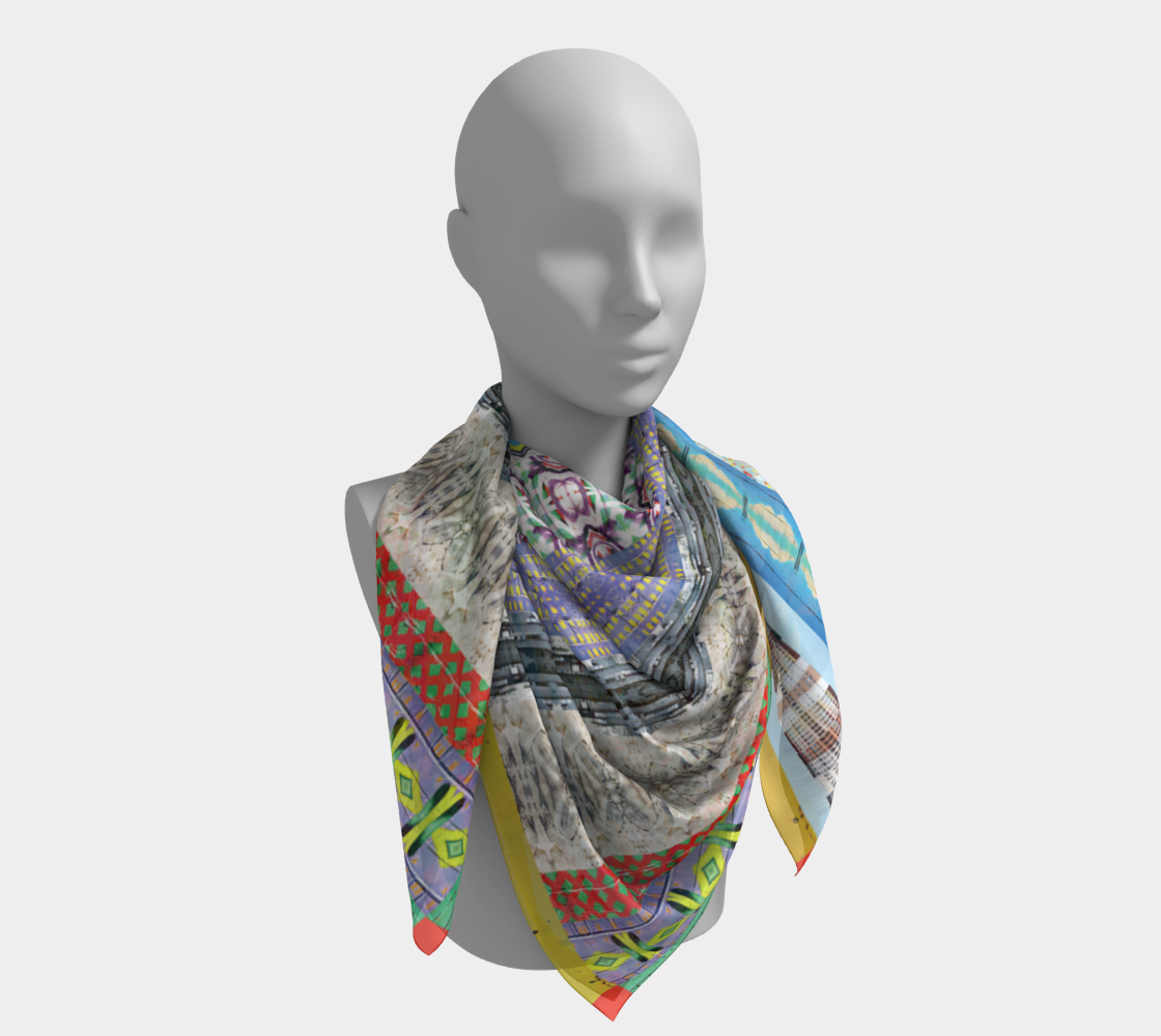 Silk scarf styled on a mannequin, titled 'Graffiti of NYC' by Leeloo + Zohan, displaying a vibrant mix of textures and colors.